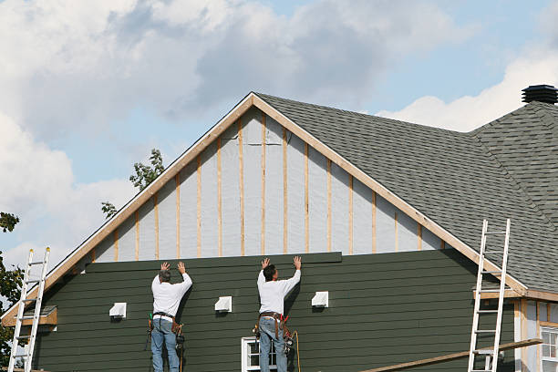 Professional Siding Installation technician working in Berea, OH